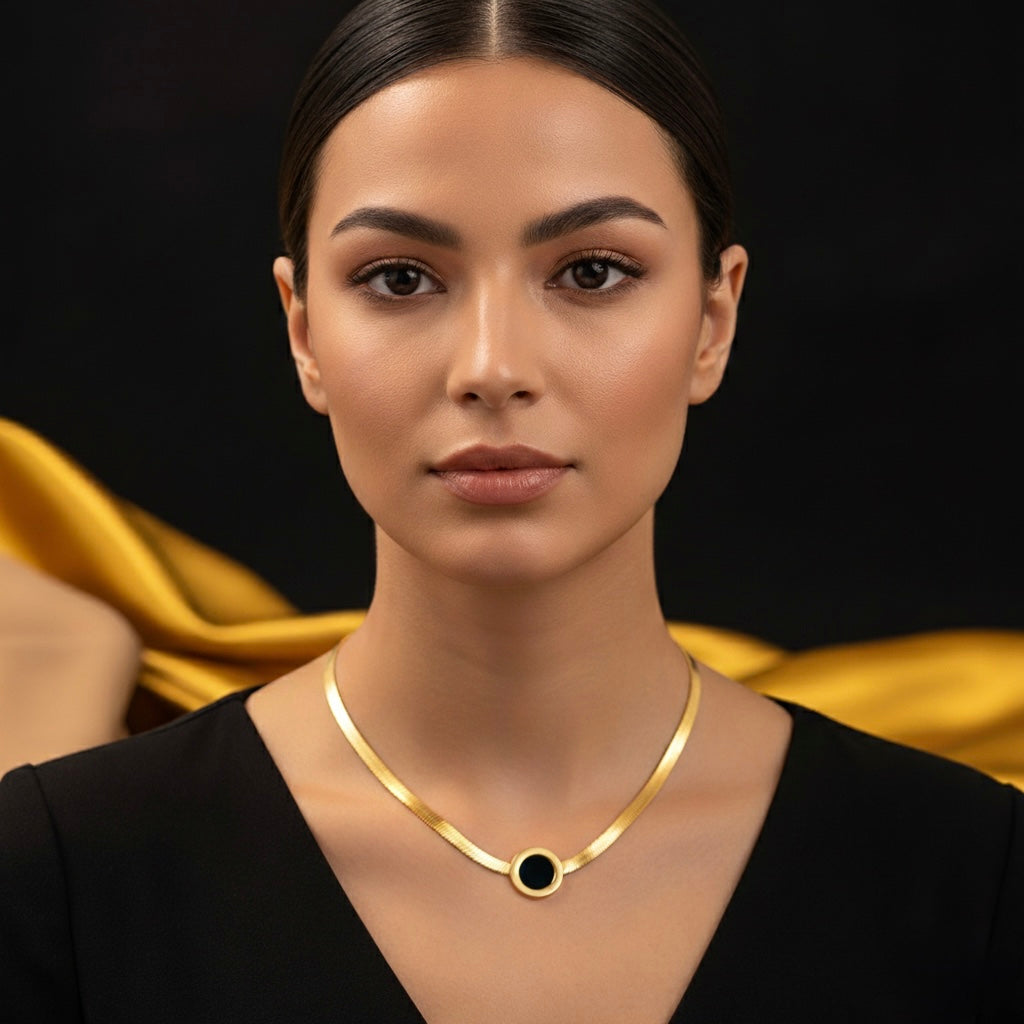 Elegant Gold Herringbone Chain Necklace with Black Enamel Circle Pendant